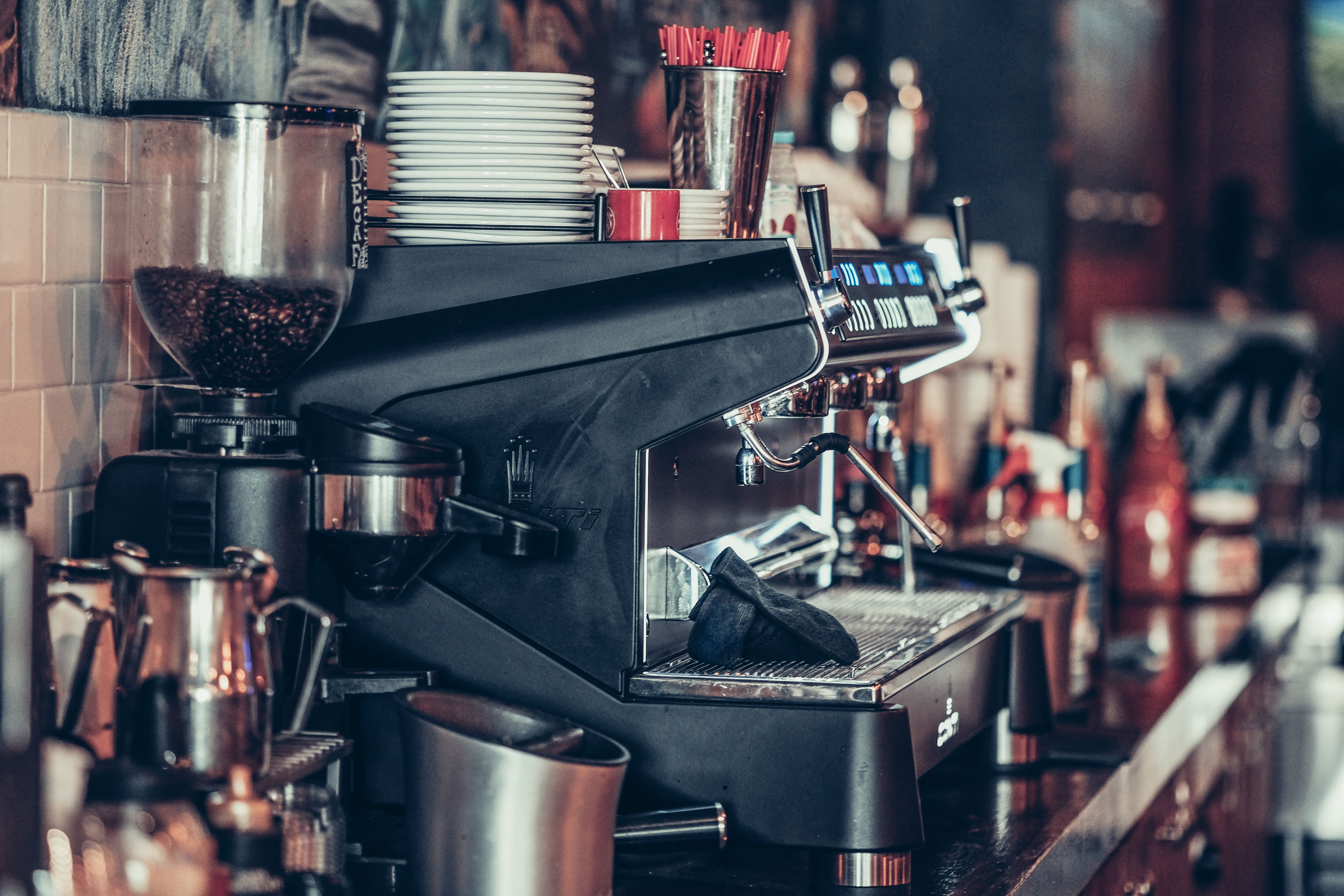 Technician servicing an espresso machine